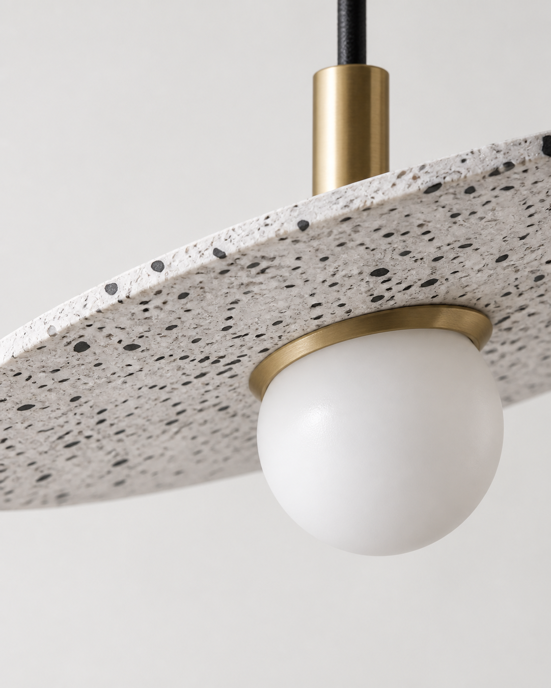 Ciretta Stone Disc Pendant Light — AI-generated stone and glass detail illustration