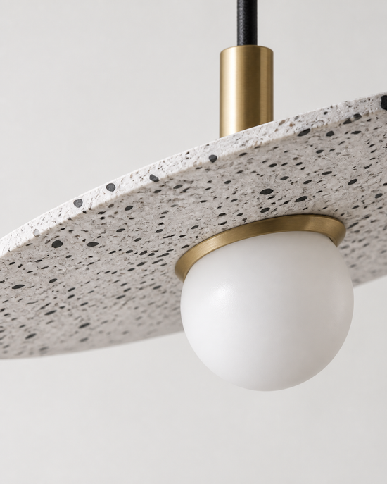 Ciretta Stone Disc Pendant Light — AI-generated stone and glass detail illustration
