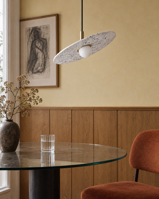 Ciretta Stone Disc Pendant Light — light off; AI-generated interior scene; White