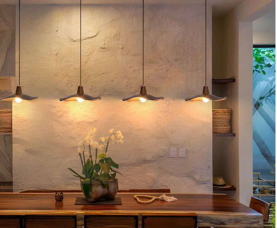 MOPOCE leaf canopy pendants over a dining space