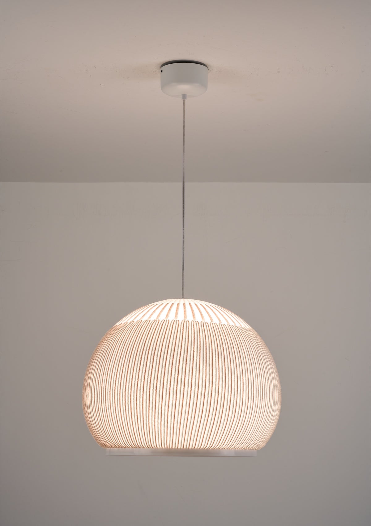 MOPOCE Pleat Round Pendant — illuminated product view