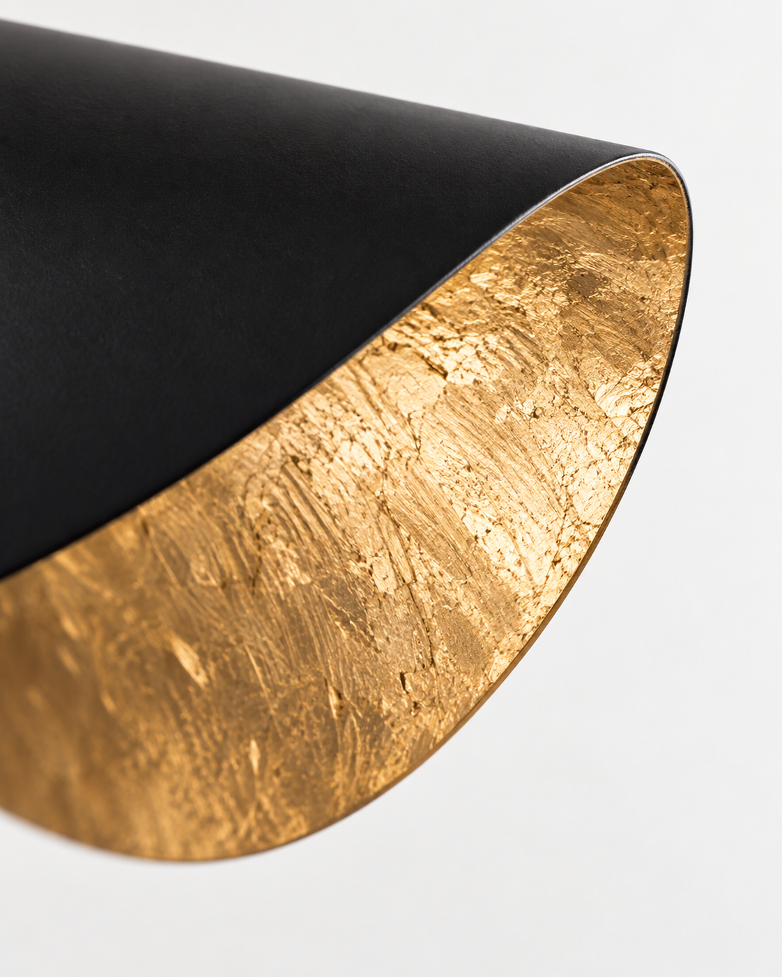 Solasa Sculptural Metal Pendant Light — AI-generated black and gold metal detail illustration