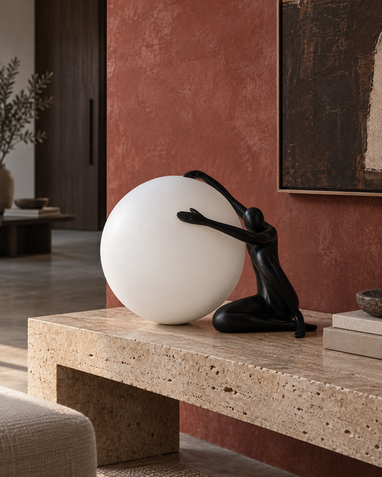 Soleno Embrace Sculptural Table Lamp — light off; AI-generated interior scene; Black
