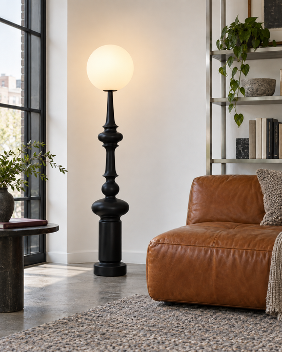 Umbione Sculptural Resin Floor Lamp — light on; AI-generated interior scene; Black, 300 mm